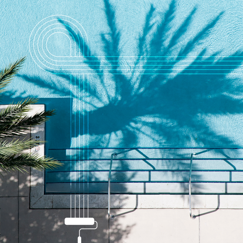 A blue pool using epoxy paint with a shadow of a palm tree.
