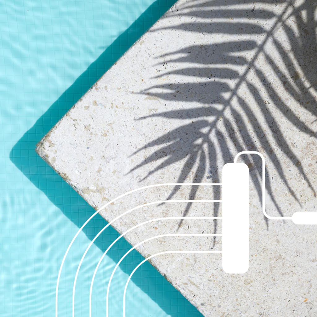 A repainted concrete pool with a palm tree.